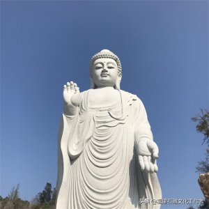 ​石雕释迦牟尼佛头上的卷发叫“肉鬓”